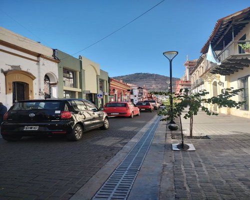 A typical urban street in a highland area of Mexico with moderate traffic